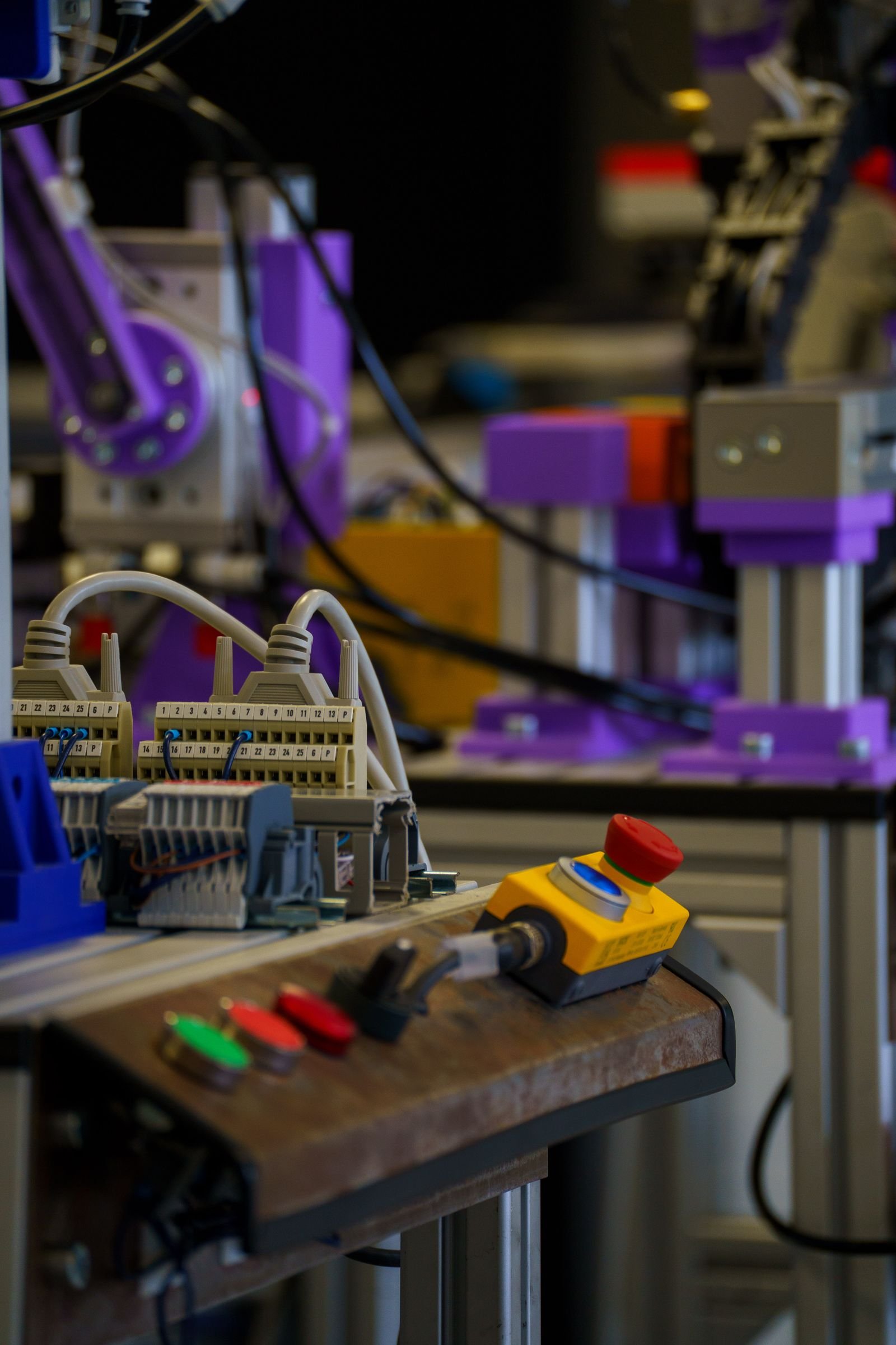 Automated control panel and robotic work cell on factory floor